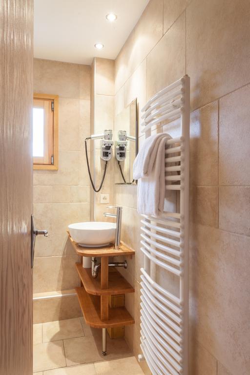 Hotel Le Caprice Des Neiges Комблу Номер фото